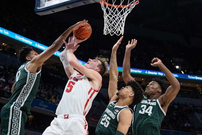 Tyler Wahl is blocked at the rim, as the Badgers fall to Michigan State in the B1G Tournament.